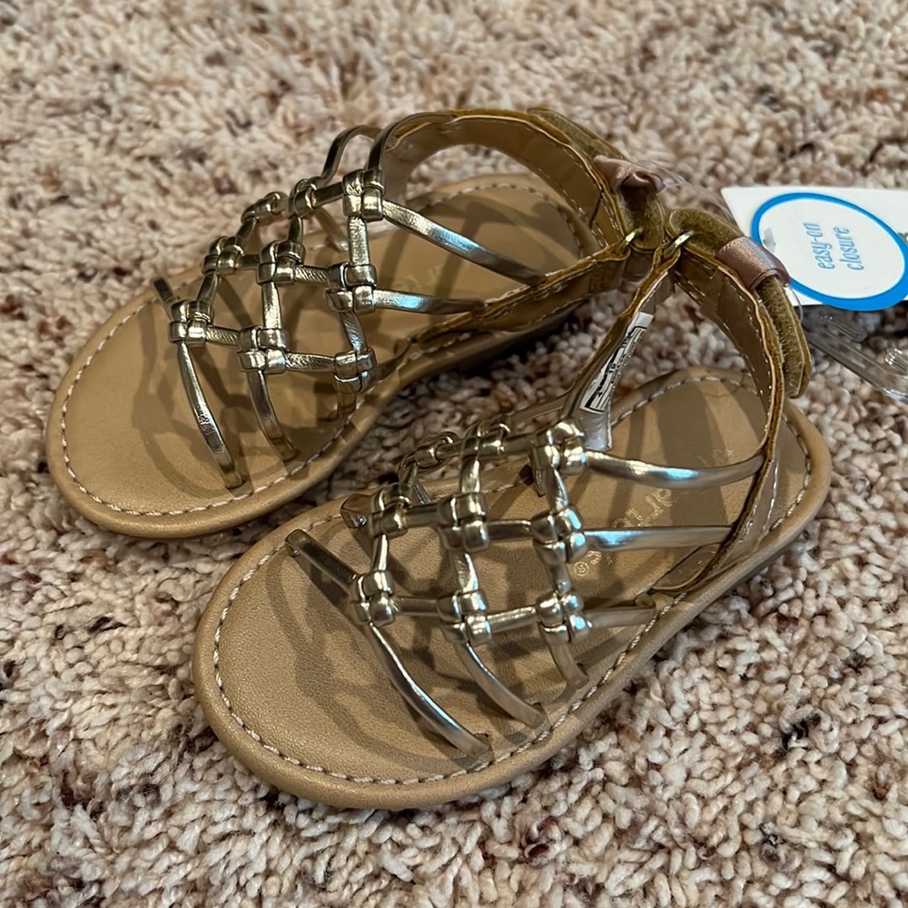 NWT Carter’s brand toddler girl’s golden sandals size 4